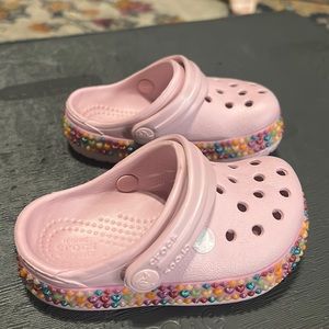 Pink crocs, baby/toddler size 6, never worn
